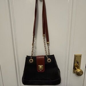 Elegant Black and Rust Leather Bag with Chain Strap